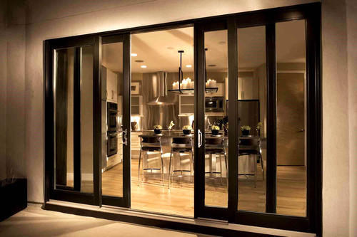 Contemporary sliding doors providing seamless indoor-outdoor access.