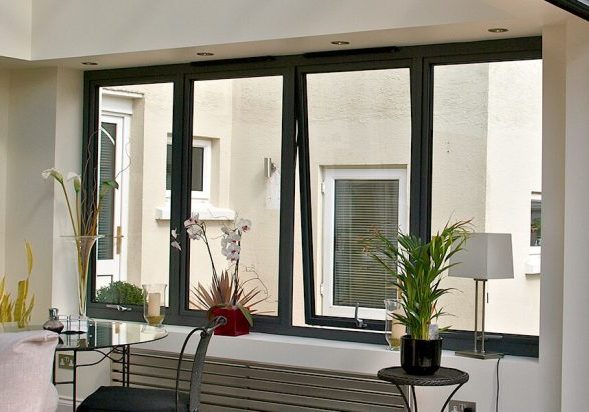 Professional aluminium casement window installation in a modern home.