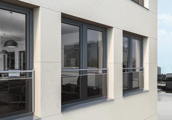 Durable Schüco safety barriers with glass panels and metal bars for enhanced security.